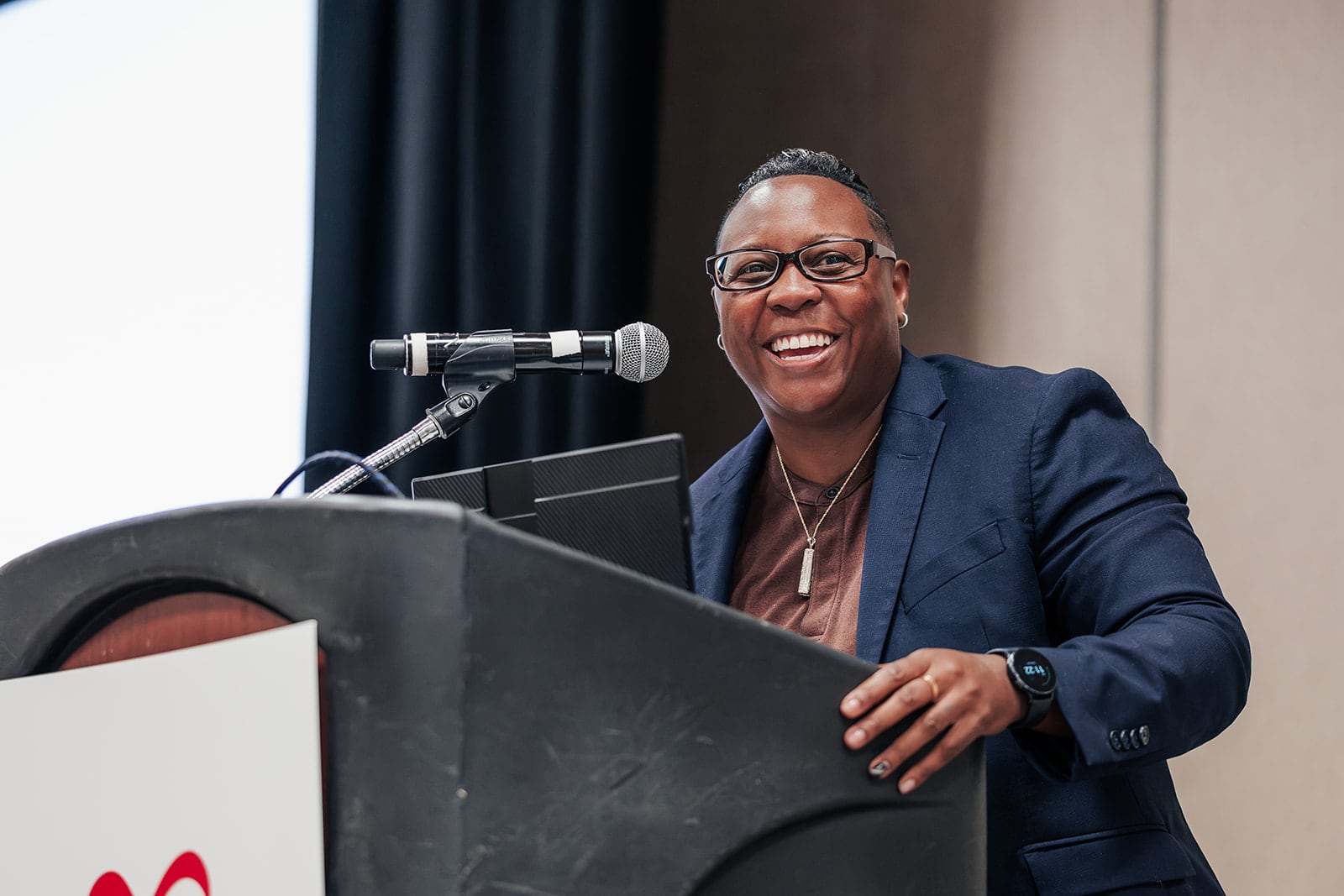 Speaker at podium at the CASA conference